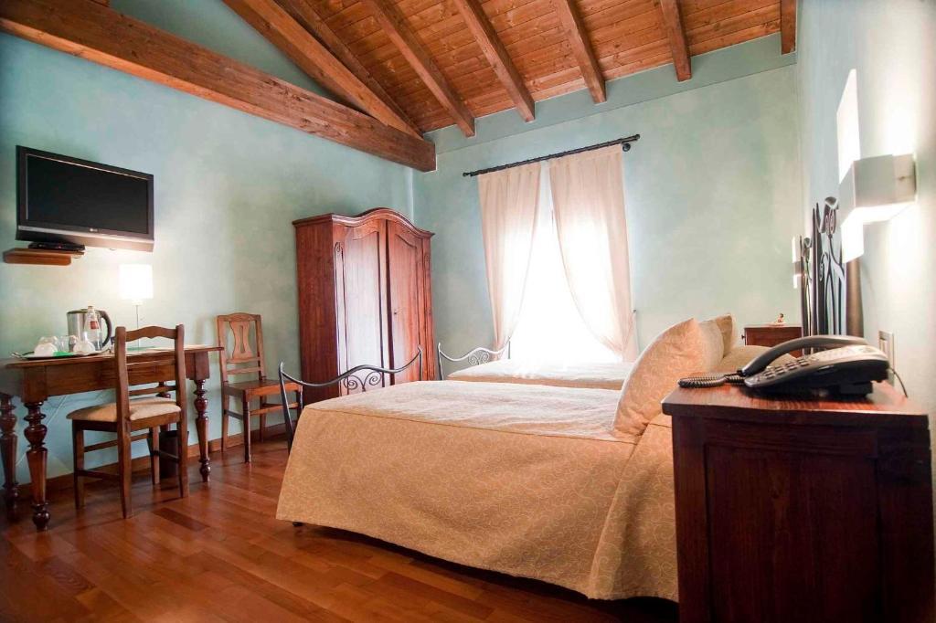 Relais Casa Orter Risano Ruang foto
